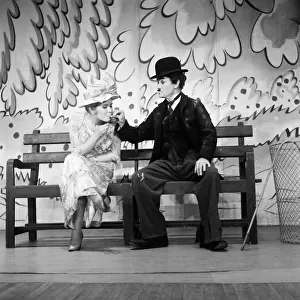Actress Juliet Mills with her father, actor John Mills who is dressed as Charlie Chaplin