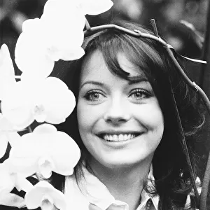 Actress Lesley Anne Down with orchid named after her when she opened the British Orchid