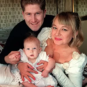 Actress Nicola Duffett with husband Ian Henderson 1995 and baby at home
