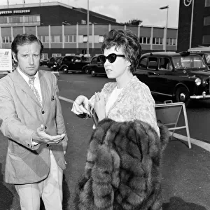 Actress Shirley MacLaine arrives at Heathrow Airport to fly to Nice. 13th May 1967