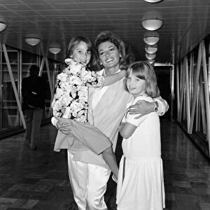Actress Stephanie Beacham at LAP with her daughters Phoebe and Chloe. 4th May 1985