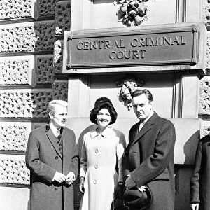 Adam Faith (left), Anne Baxter and Donald Sinden pose outside the Central Criminal Court