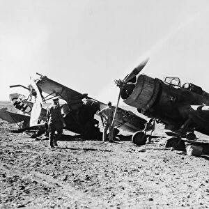 Air war at Libya. Two Italian aircraft destroyed at Gazala by the RAF