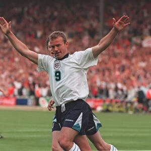 Alan Shearer celebrates Englands first goal against Holland in their euro 96 clash at