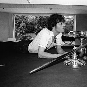Alex Higgins World Snooker Champion 1982 with his daughter Lauren as she tries to