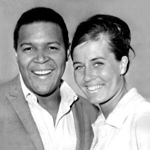 American king of twist Chubby Checker arrives in London with his ex-Miss World wife