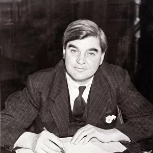 Aneurin Bevan siting behind desk with paper work in front of him. Unknown date