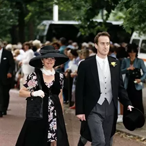 Angus Deayton Actor and TV Presenter with unidentified woman attends Sarah Amstrong Jones