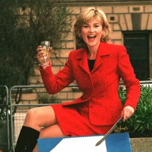 Anthea Turner TV Presenter celebrates 1 year of the National Lottery with a cake