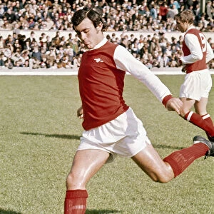 Arsenal footballer Ray Kennedy warms up before the league dvision one match against