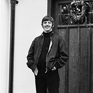 Beatles drummer Ringo Starr outside his home in Weybridge after being served with a writ