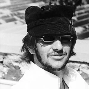 Beatles drummer Ringo Starr wearing sunglasses and hat during his holiday in Tobago