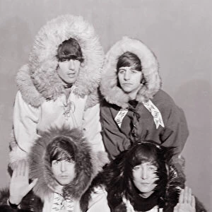 Beatles group shot wearing eskimo outfits December 1964 Top row George Harrison