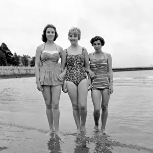 Beauty contest girls playing on the beach at Torquay. 7th September 1960