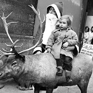 Billy Cadell met Santa and Rudolph the reindeer in Market Street, Edinburgh