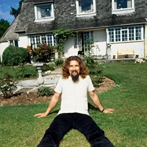 Billy Connolly outside house in Drymen June 1980