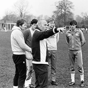 Birmingham City football manager Ron Saunders gets down to work with his players at