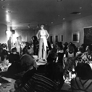 Over breakfast of bacon and eggs, with champagne, guests watch the Mary Quant Spring 1972