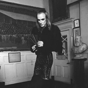 Brian Eno holding his award at The Oval Pop Festival, Oval Cricket Ground
