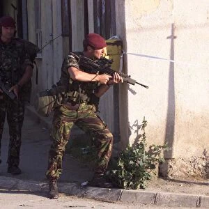 British KFOR paratroopers at the scene where local serb Gunmen in the village of Lipjan