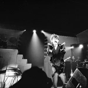 British pop group The Thompson Twins performing on stage during a concert in Oxford