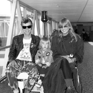 Britt Ekland actress and her husband Jim McDonnell with her son Thomas arriving at