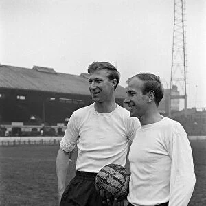 Brothers Jack Charlton (l) and Bobby Charlton (r) pose for pictures ahead of training