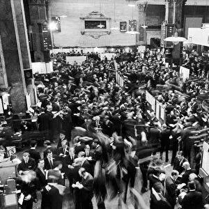 Busy scenes showing crowds of traders in a hurry at the London Stock Exchange shorlty