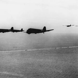C-47 transport planes. Troop carrying planes of Ninth Air Force towing gliders