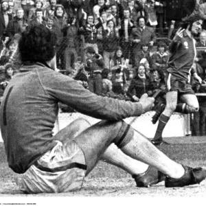 Cardiff Citys Robin Friday gives a two finger salute to Luton goalkeeper Milija