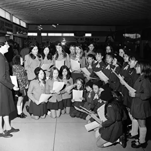 Carol singers in Cleveland Centre. Middlesbrough, North Yorkshire, 1973