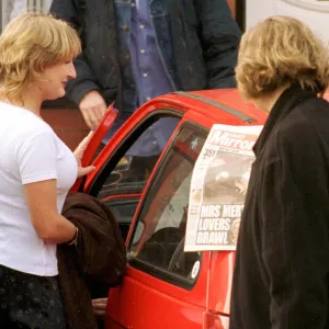 Caroline Aherne who plays television characture Mrs Merton is shown a copy of the Daily