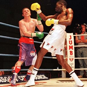 Cassius Baloyi lands a right on Brian Carr June 1999