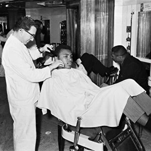 Cassius Clay aka (Muhammad Ali) getting shave in London