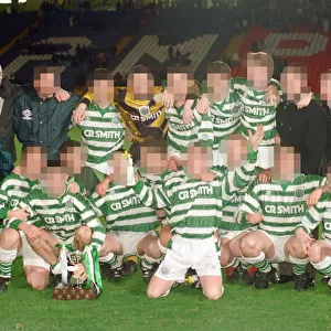 Celtic Youth team celebrate with the trophy following their 4-1 victory over Dundee in