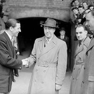 Chelsea Manager Ted Drake (left) shakes hands with the 1, 000