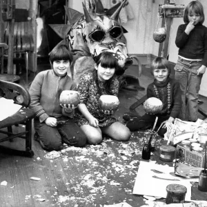 These children are making turnip lanterns, masks and a dragon for Halloween in October