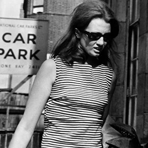 Christine Keeler - July 1963 arriving at her London flat after she had been away in