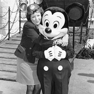 Cilla Black with Disney characters in Battersea park at the giant model which Disney