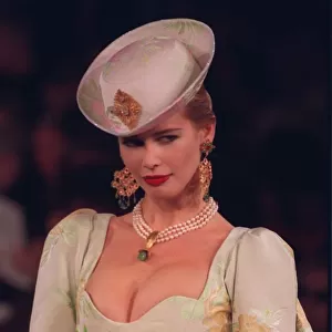 Claudia Schiffer models a wedding dress by Yves Saint Laurent at the Paris Fashion Show