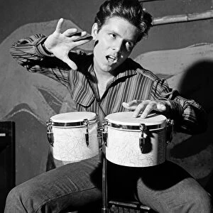 Cliff Richard playing the drums, 1959