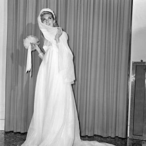 Clothing Fashion June 1965 Nicky Allen wearing Kudti bridal wedding dress in white