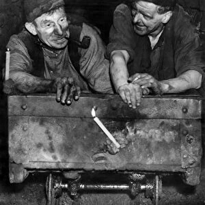 Coal miners at Rochdale pit on a mine cart. October 1947 P018219