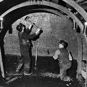 Coal Mines underground scenes: Miners at work. January 1944 P017836