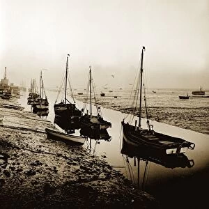 Cockle fishing boats moored in an estuary near the east coast of England. 1963