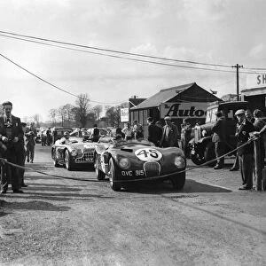 Competitors in the pit area of Oulton Park race track. Motor racing. April 1954 P009548