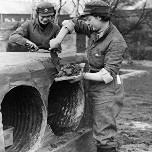 Cooks of the Auxiliary territorial Service (ATS) seen here building a training tunnel