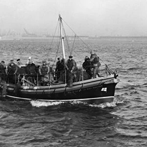 The crew of the New Brighton lifeboat seen here aboard their new vessel The Edmund