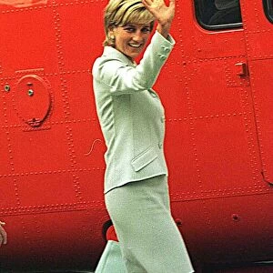 Diana, Princess of Wales preparres to board the helicopter Queen