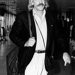 Donald Sutherland leaving Heathrow airport for New York by Concorde. 19th September 1985